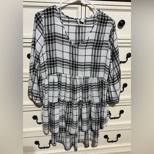 Black and white plaid shirt. Size small